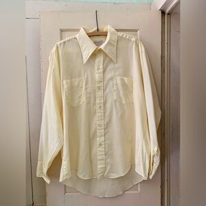 Vintage 1970s Chancellor cream colored button down long sleeved top.
